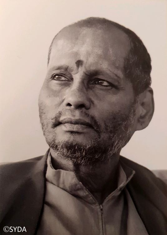 Close up, black and white photo of Baba 
